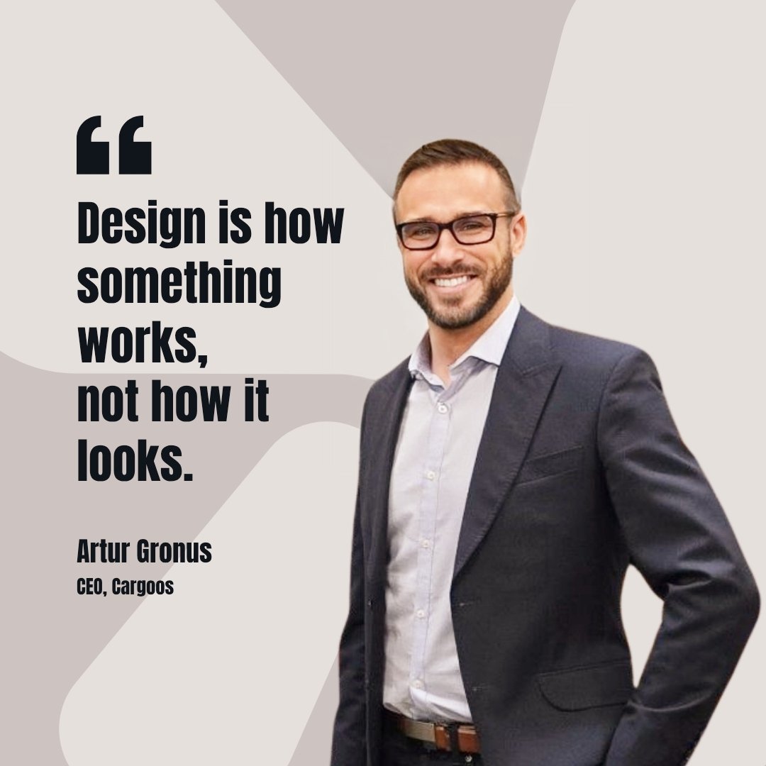 Artur Gronus, CEO of Cargoos, standing and smiling in a suit beside a quote about design thinking in logistics.